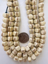 off white brown, carved line motif, vintage stock bone, 11x9mm 3 sided rondelle, 11.5" strand, SOLD PER  STRAND