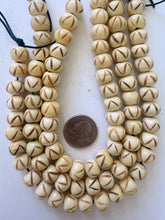 off white brown, carved zig zag lines motif, vintage stock bone, 12x10mm rondelle, 11.5" strand, SOLD PER STRAND
