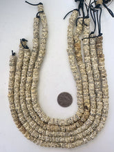 off white black, carved dot greek key motif, vintage stock bone, 8x6mm rondelle, 15" strand, SOLD PER STRAND