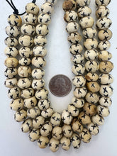 off white, carved x motif, vintage stock bone, 14x11mm rondelle, 12" strand,  SOLD PER STRAND