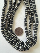 black off white, spiral motif, vintage stock bone, 11x8mm barrel, 15" strand, SOLD PER STRAND