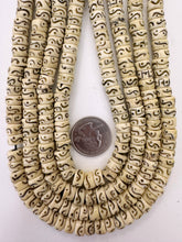 off white black, carved dot wavy line motifs, vintage stock bone, 9x5mm rondelle, 15" strand, SOLD PER STRAND