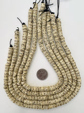off white black, carved dot wavy line motifs, vintage stock bone, 9x5mm rondelle, 15" strand, SOLD PER STRAND