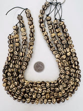 brown off white, spiral motif, vintage stock bone, 12x8mm rondelle, 15" strand, SOLD PER STRAND