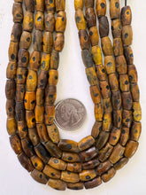 brown black, carved dot motif, vintage stock horn, 16x7mm tube, 15" strand, SOLD PER STRAND