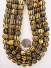 brown black, carved melon cut motif, vintage stock horn, 15x12mm rondelle, 15" strand, SOLD PER STRAND