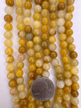 old yellow jade, 8mm round, 15" strand,  SOLD PER STRAND