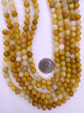old yellow jade, 8mm round, 15" strand,  SOLD PER STRAND