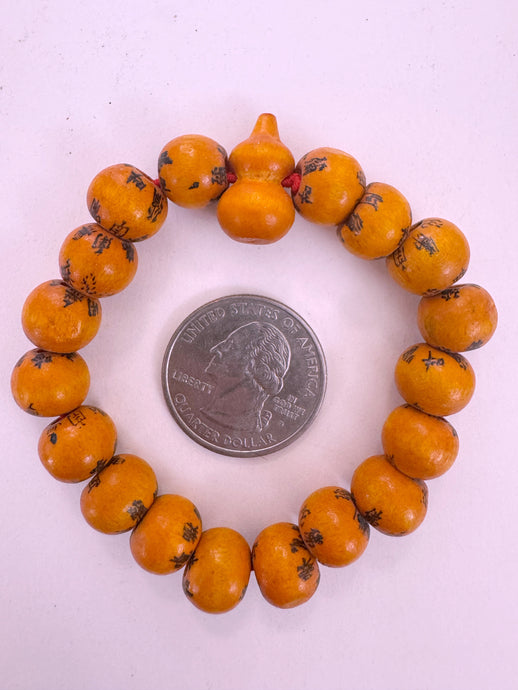 black chinese symbols, orange enhanced wood, 11mm round, vintage stock,  6