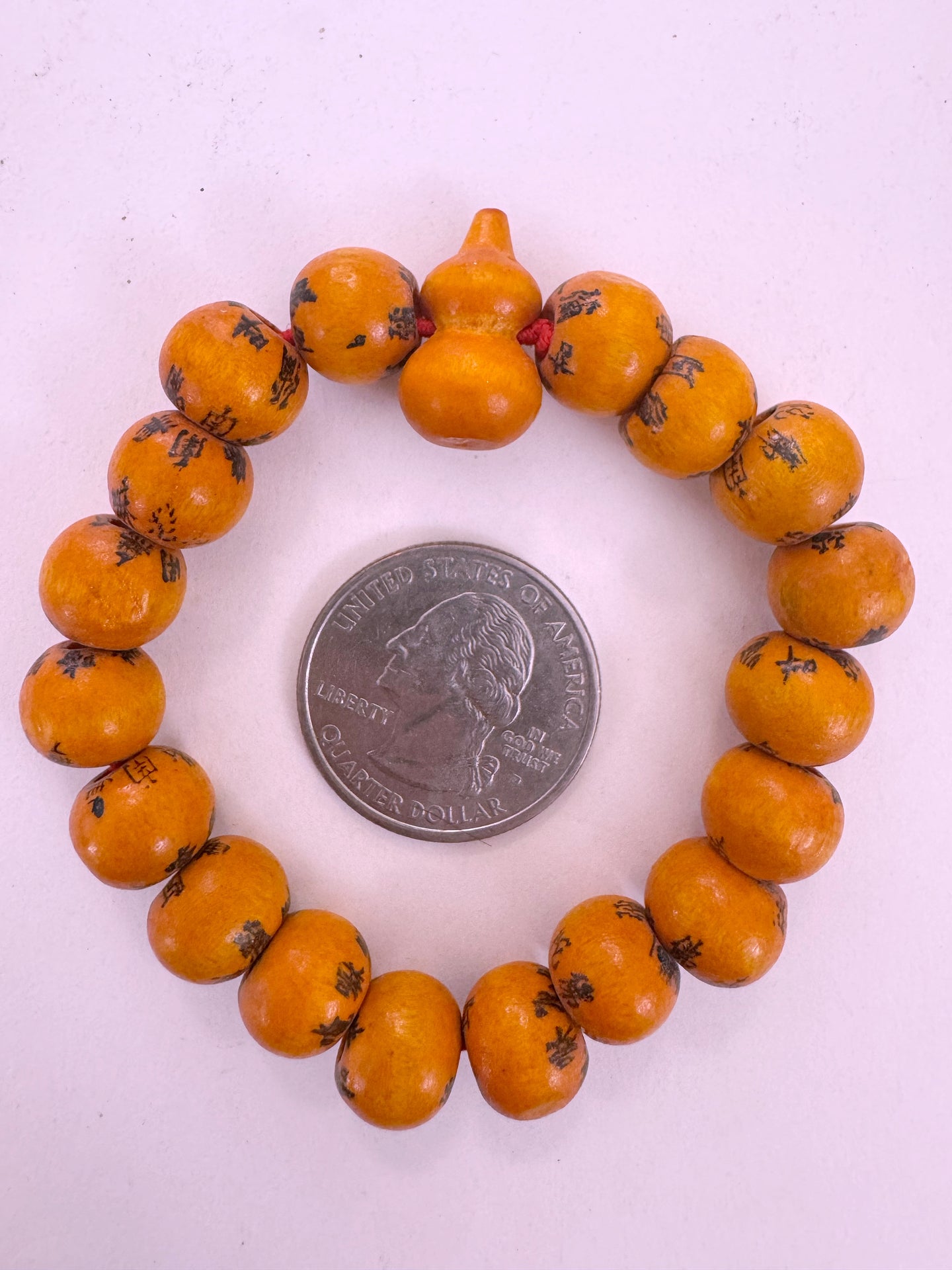 black chinese symbols, orange enhanced wood, 11mm round, vintage stock,  6