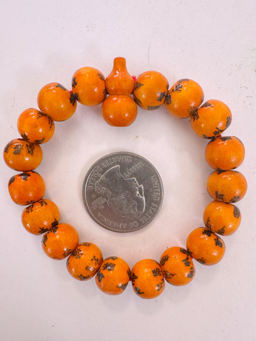 black chinese symbols, red orange enhanced wood, 11mm round, vintage stock,  6