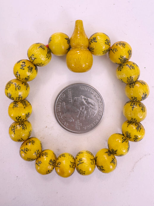black chinese symbols, yellow enhanced wood, 11mm round, vintage stock,  6