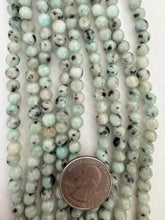 kiwi quartz, 6mm round, 15" strand,  SOLD PER STRAND
