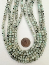 kiwi quartz, 6mm round, 15" strand,  SOLD PER STRAND