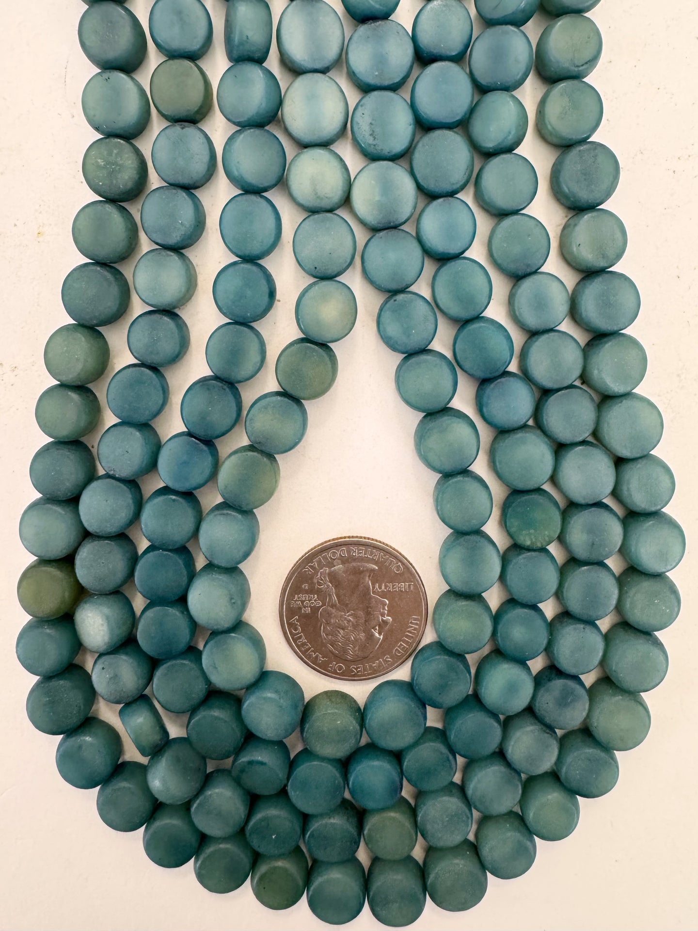dark blue green enhanced natural seed, 9x9x6mm coin mix, 15
