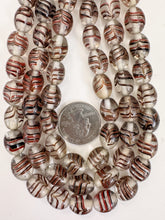 clear black red metallic copper feathered swirl, vintage look glass, 12x10mm barrel bowed tube, 15" strand, sold per strand