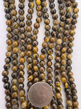 tiger eye, 6mm round, 15" strand,  SOLD PER STRAND