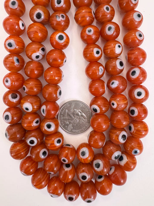red orange swirl black white evil eye motif, vintage look glass, 13x11mm rondelle, 15