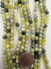 yellow turquoise, 6mm round, 15" strand,  SOLD PER STRAND