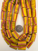 mustard yellow dark swirl red white stripe, vintage look glass, 25x14mm tube, 15" strand, sold per strand