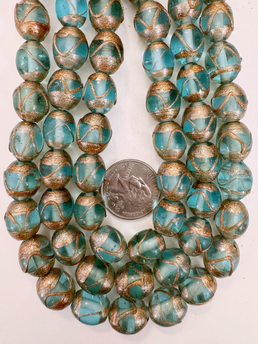 light blue metallic copper swirl, vintage look glass, 14x12mm barrel, 15