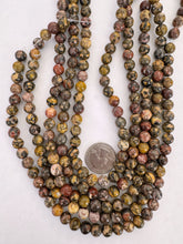 red leopard skin jasper, 8mm round, 15" strand,  SOLD PER STRAND