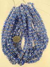 clear pale blue white pink pearly copper inside lined, vintage look glass, 10x9mm barrel tube, 15" strand, sold per strand