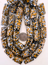 white pale red orange black spotted swirl motif, vintage look glass, 26x16mm barrel, 15" strand, sold per strand