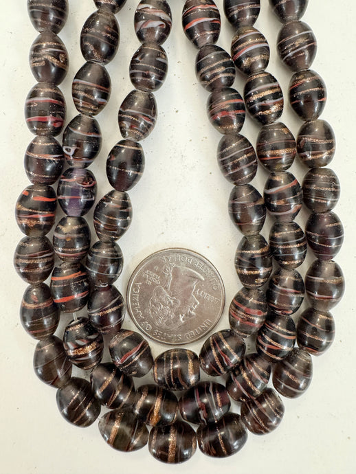 dark purple white red metallic copper swirl motif, vintage look glass, 11x9mm bowed tube barrel, 15