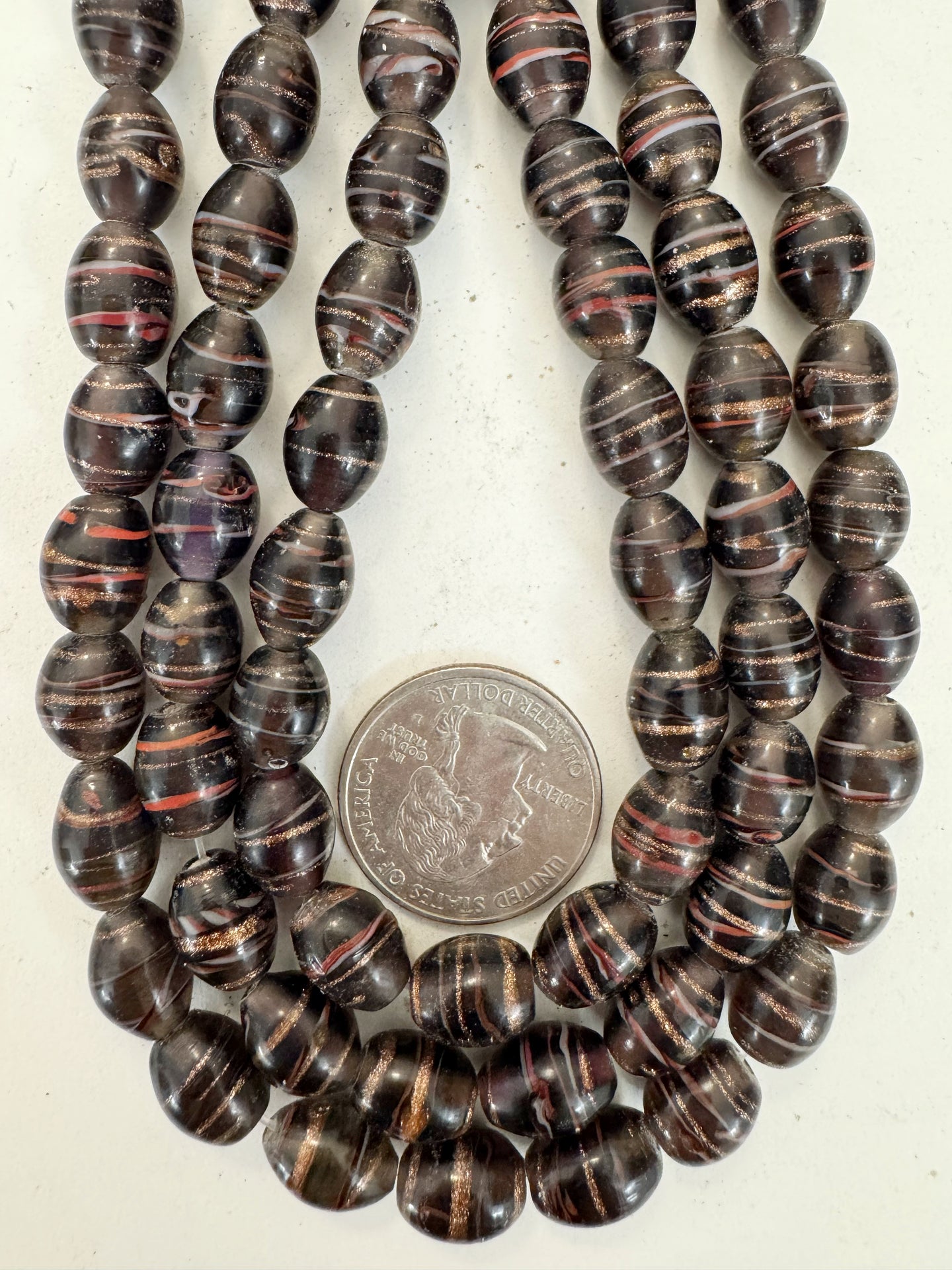 dark purple white red metallic copper swirl motif, vintage look glass, 11x9mm bowed tube barrel, 15