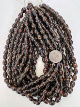 dark purple white red metallic copper swirl motif, vintage look glass, 11x9mm bowed tube barrel, 15" strand, sold per strand
