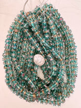 clear blue green magenta white metallic copper swirl dotted inside lined motif, vintage look glass, 10x8mm rondelle, 15" strand, sold per strand