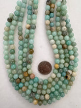 amazon, 8mm round, 15" strand,  SOLD PER STRAND