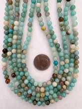 amazon, 6mm round, 15" strand,  SOLD PER STRAND