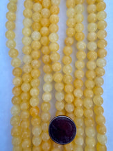 yellow calcite, 8mm round, 15" strand,  SOLD PER STRAND