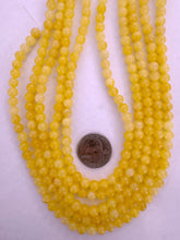 yellow calcite, 6mm round, 15" strand,  SOLD PER STRAND