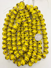 yellow black metallic copper swirl, vintage look glass, 17x15mm rondelle, 15" strand, sold per strand