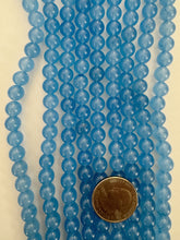 color enhanced calcedony: pale blue, 8mm round, 15" strand,  SOLD PER STRAND