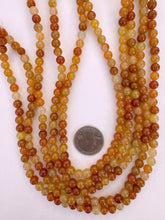 red aventurine, 6mm round, 15" strand,  SOLD PER STRAND