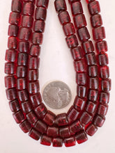 dark red  spotted metallic inside lined, vintage look glass, 9mm barrel, 15" strand, sold per strand