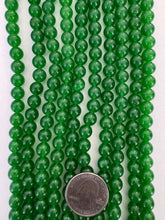color enhanced quartz: emerald green, 8mm round, 15" strand,  SOLD PER STRAND