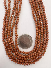 goldstone, 4mm faceted round, 15" strand,  SOLD PER STRAND