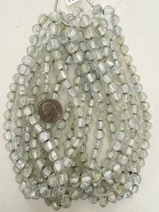 clear yellowed metallic inside lined motif, vintage look glass, 9mm melon cut round, 15" strand, sold per strand