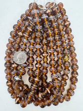 dark amber brown white metallic copper feathered swirl motif, vintage look glass, 13mm round semi-round mix, 15" strand, sold per strand