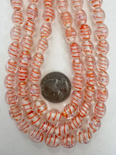 clear red orange white magenta swirl motif, vintage look glass, 11x9mm bowed tube, 15" strand, sold per strand