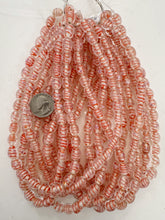 clear red orange white magenta swirl motif, vintage look glass, 11x9mm bowed tube, 15" strand, sold per strand