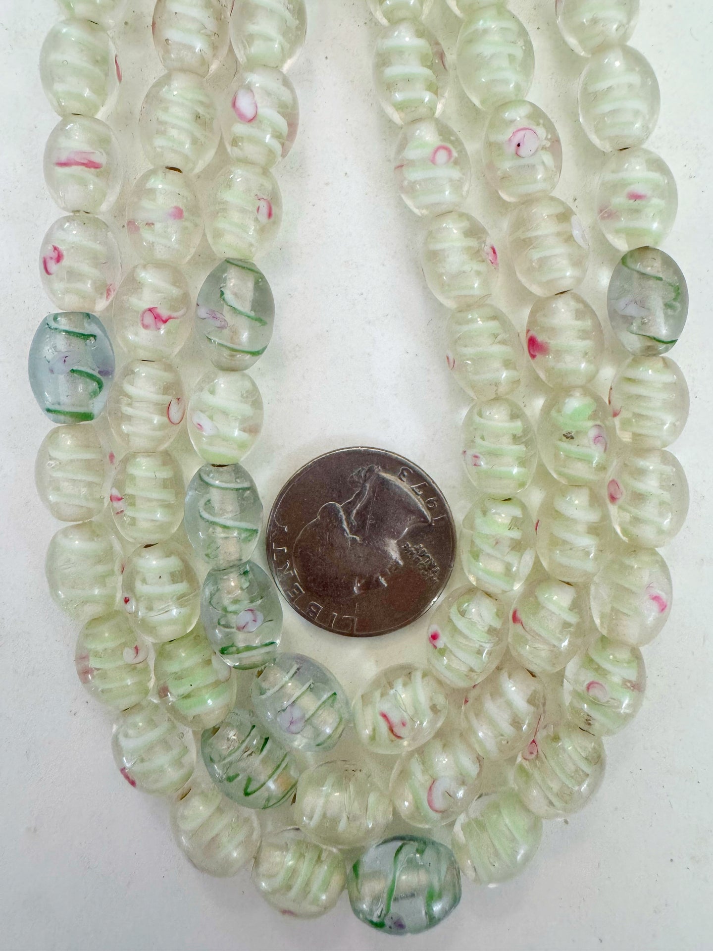 clear light and dark green white magenta swirl motif, vintage look glass, 11x9mm bowed tube, 15