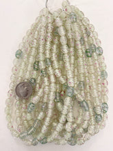 clear light and dark green white magenta swirl motif, vintage look glass, 11x9mm bowed tube, 15" strand, sold per strand