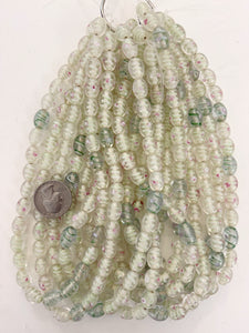 clear light and dark green white magenta swirl motif, vintage look glass, 11x9mm bowed tube, 15" strand, sold per strand