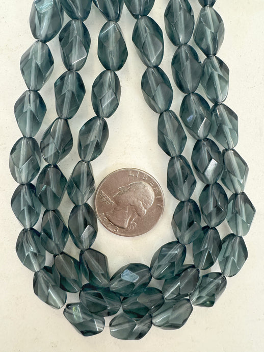 dark blue gray, single color, vintage look glass, 10x7mm fancy facet cut bowed tube, 14